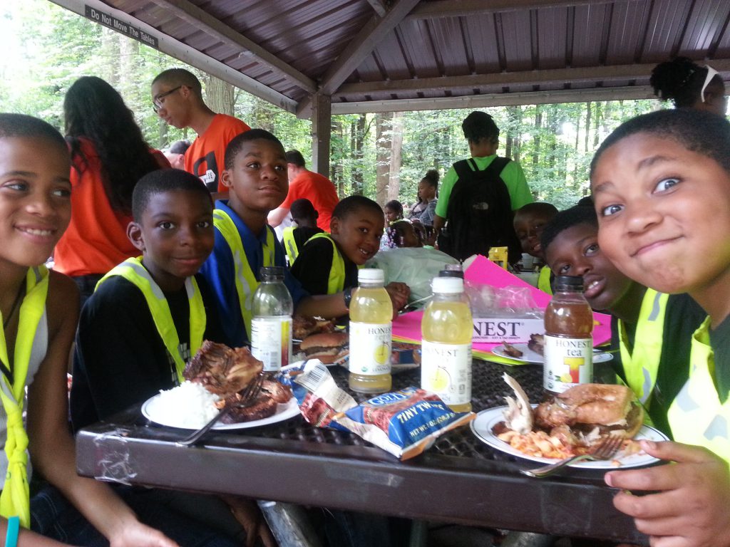 African American children picnicking.