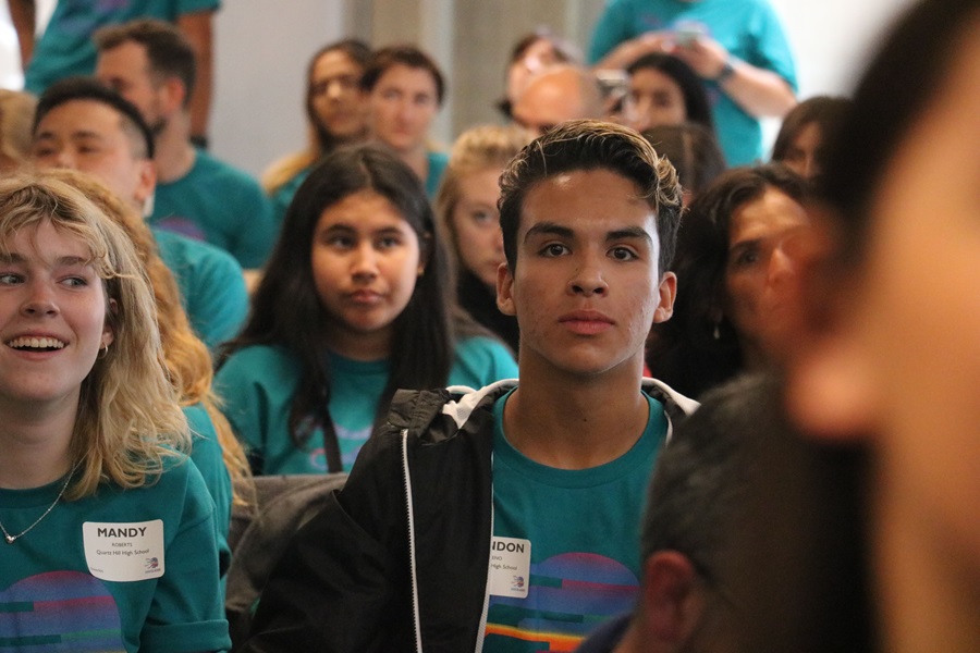 Teenage boy listens intently to Digital4Good speaker