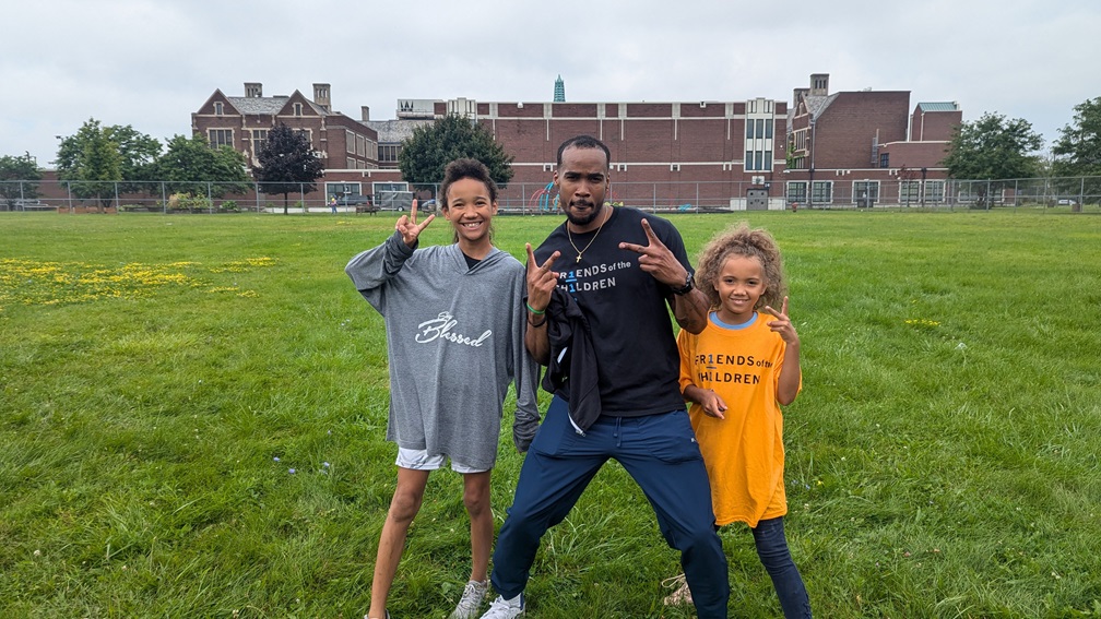 FR1ENDS of the CH1LDREN Detroit mentor Abe with two mentees