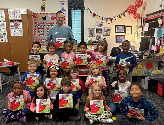 Brownsburg Education Foundation MENtor program participants with books