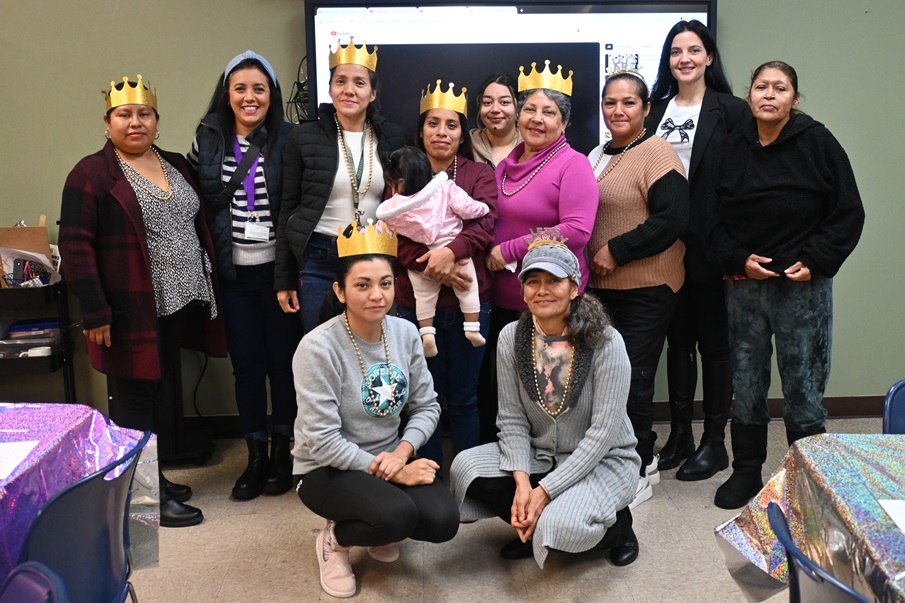 Folsom Cordova Community Partnership group photo, women wear crowns