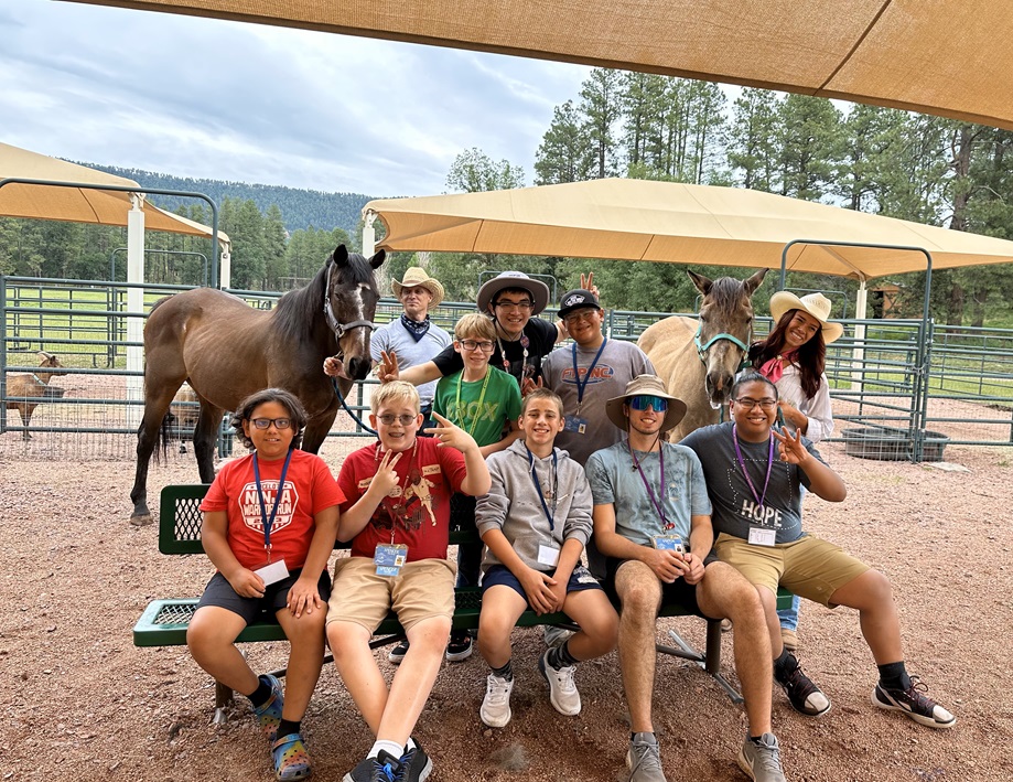 Arizona Camp Sunrise and Sidekicks Southwest Kids Cancer Foundation group photo with horses