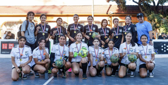 oakland genesis girl soccer league group photo kneeling on one knee in front, standing behind